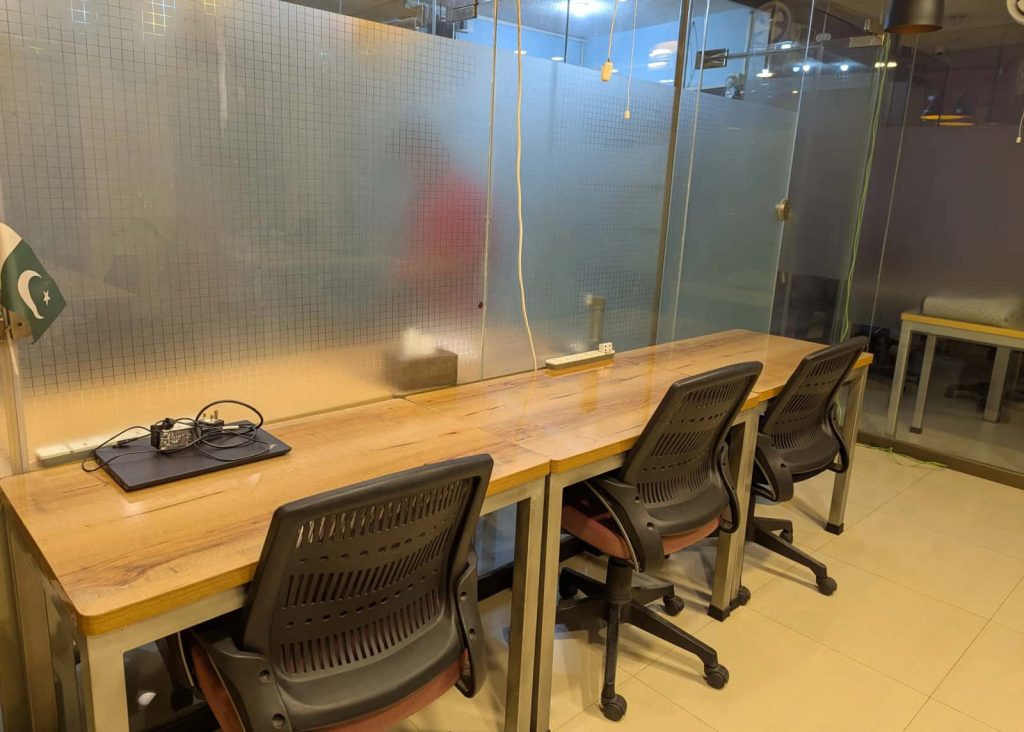 A dedicated desk with the member name on it at Desk&Wifi Coworking, Bahria Town, Lahore